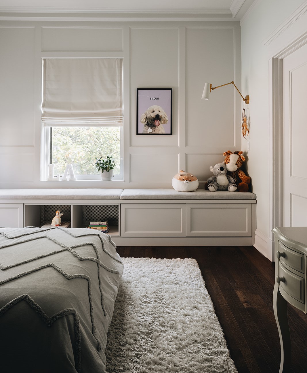 kids room with abundant storage and large window