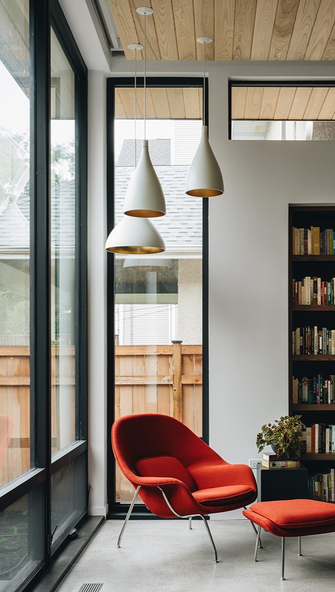 comfortable chair in the corner of a personal library