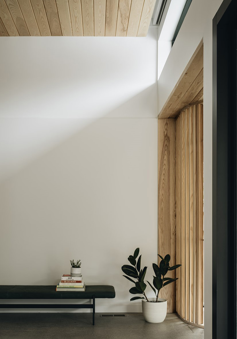 comfortable bench with plant accents