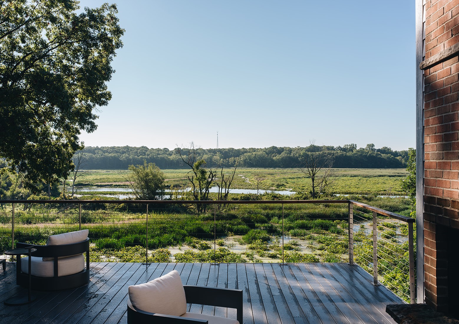 Rear view back porch with wide open natural view