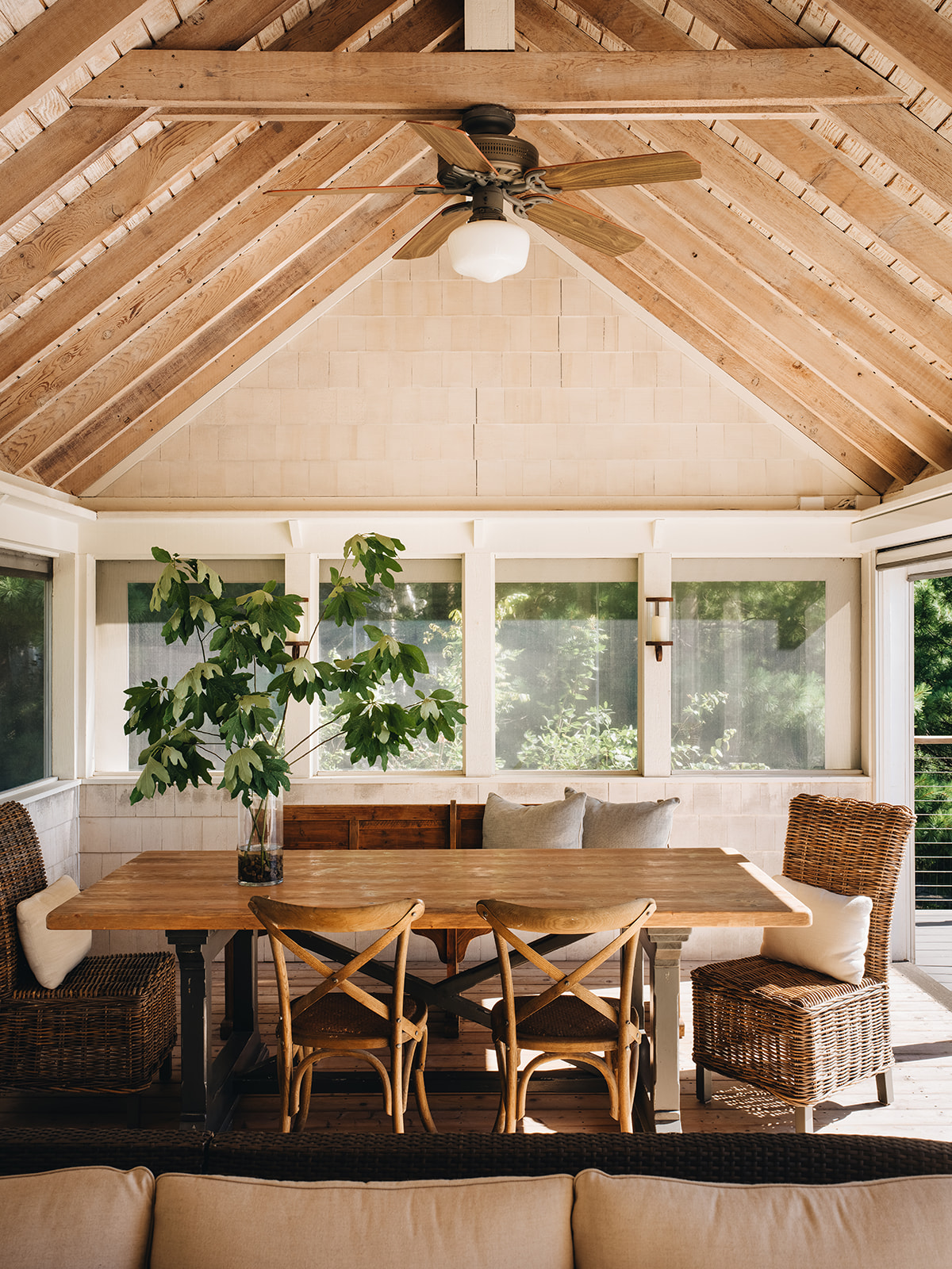 Enclosed Patio with high ceilings and beautiful furniture