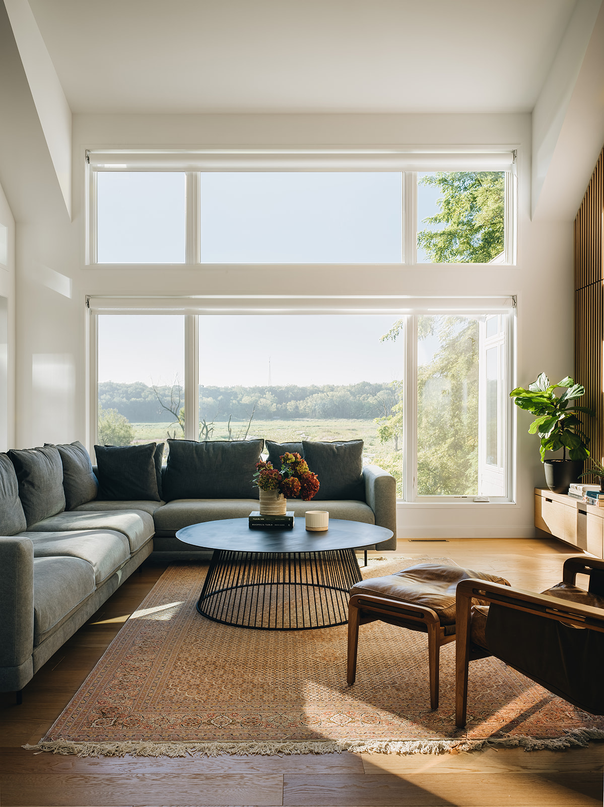 Living room with wide open windows and striking detail